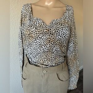 Victoria’s Secret Pink cheetah print long sleeve body suit